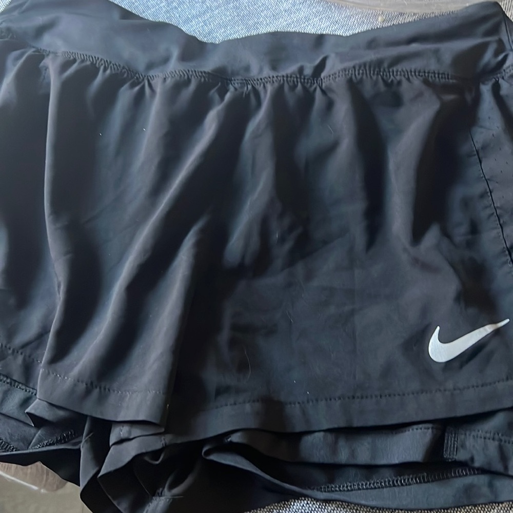 Comfortable nike shorts with built in spandex , in good condition as well.